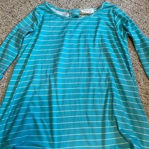 Light blue , striped, long-ish sleeved shirt